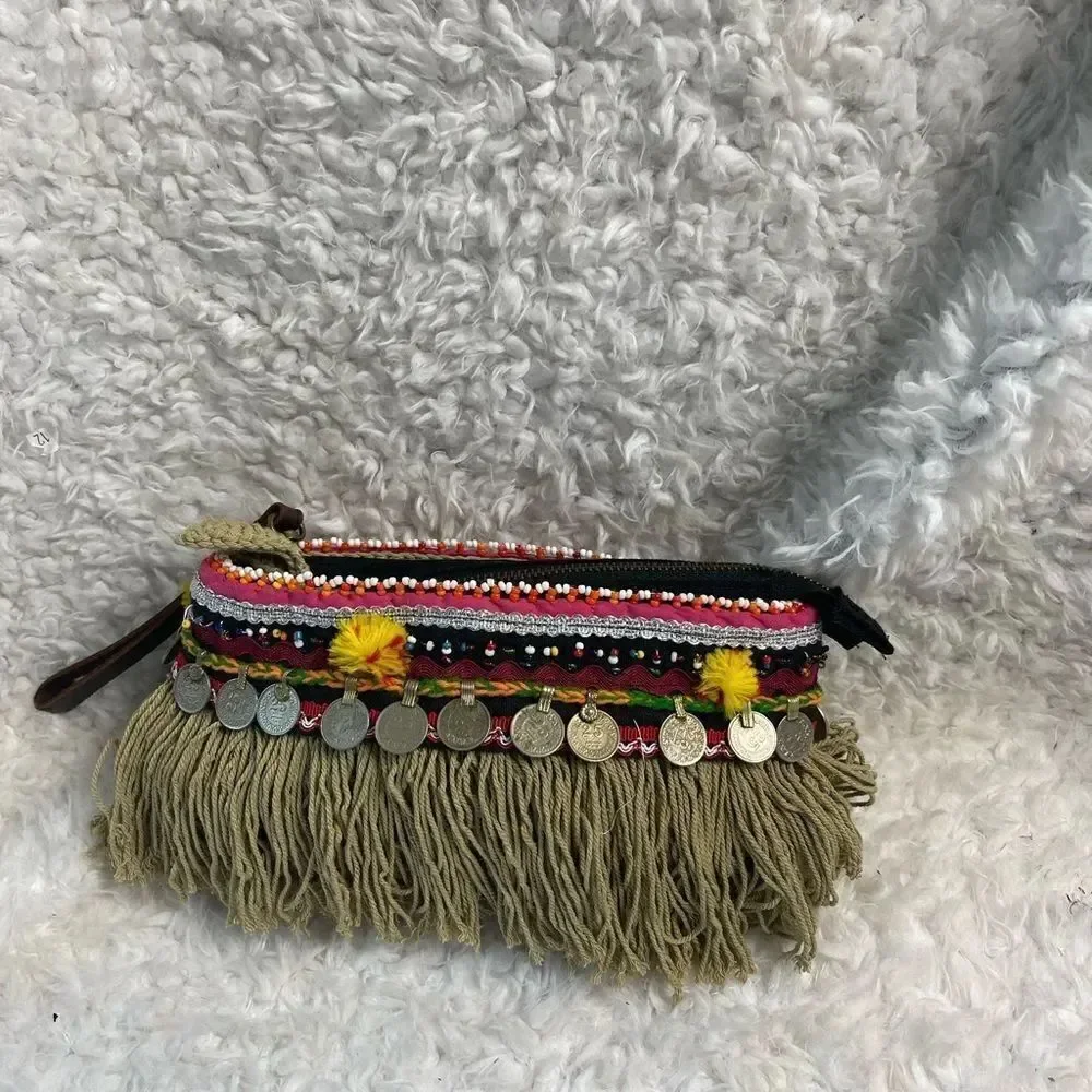 - Elliott Mann Indie multi color clutch with beads and coins accents.